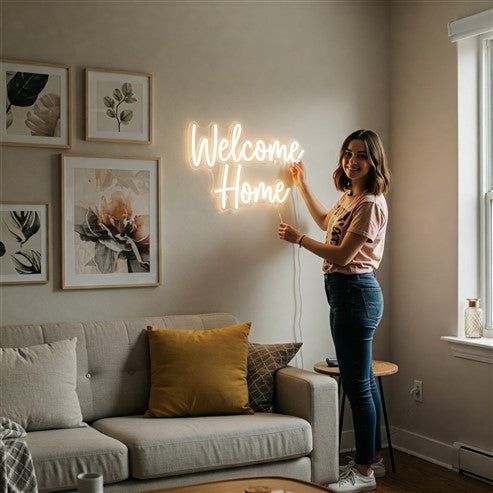 Bright and inviting living room with a warm white neon sign reading 'Welcome Home,' adding a personal and stylish touch to the cosy decor.