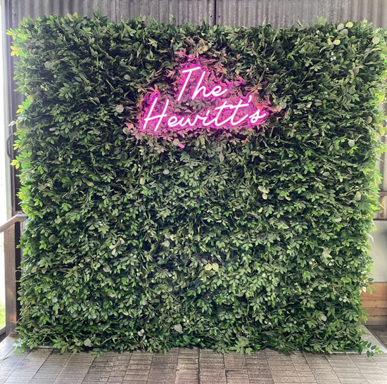 Flower Wall and Neon Sign