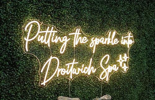 personalised neon signs and floral backdrops